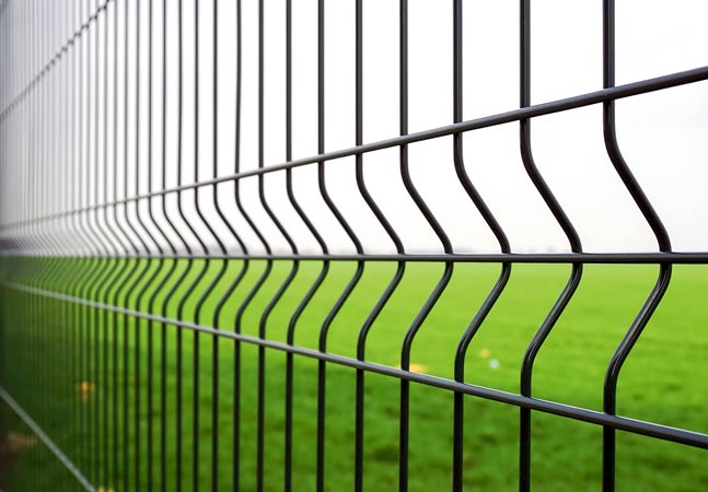 Gray Fence and Green Grass Graphic